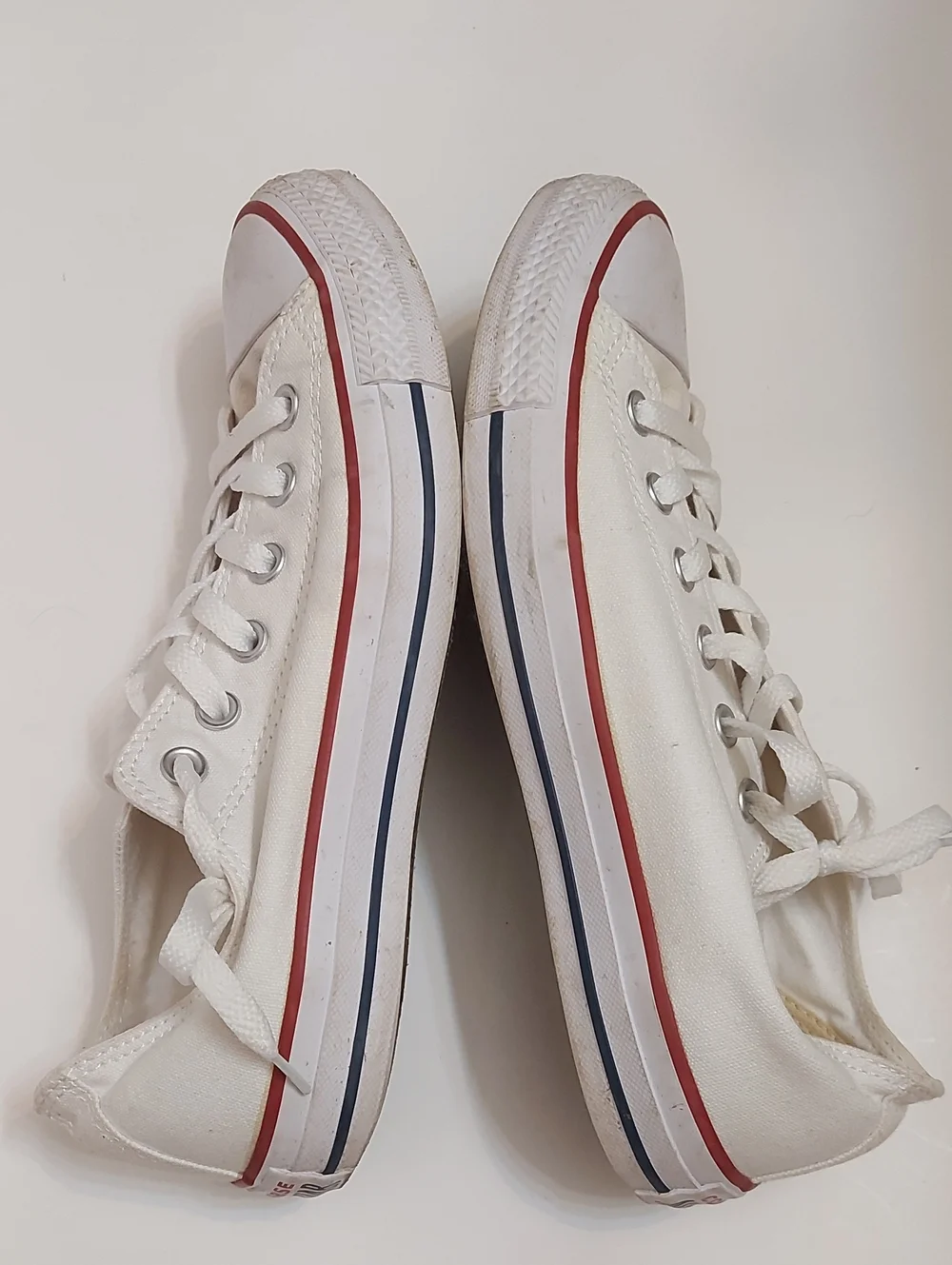 Converse White Canvas Low-Top Sneakers with Red Rim